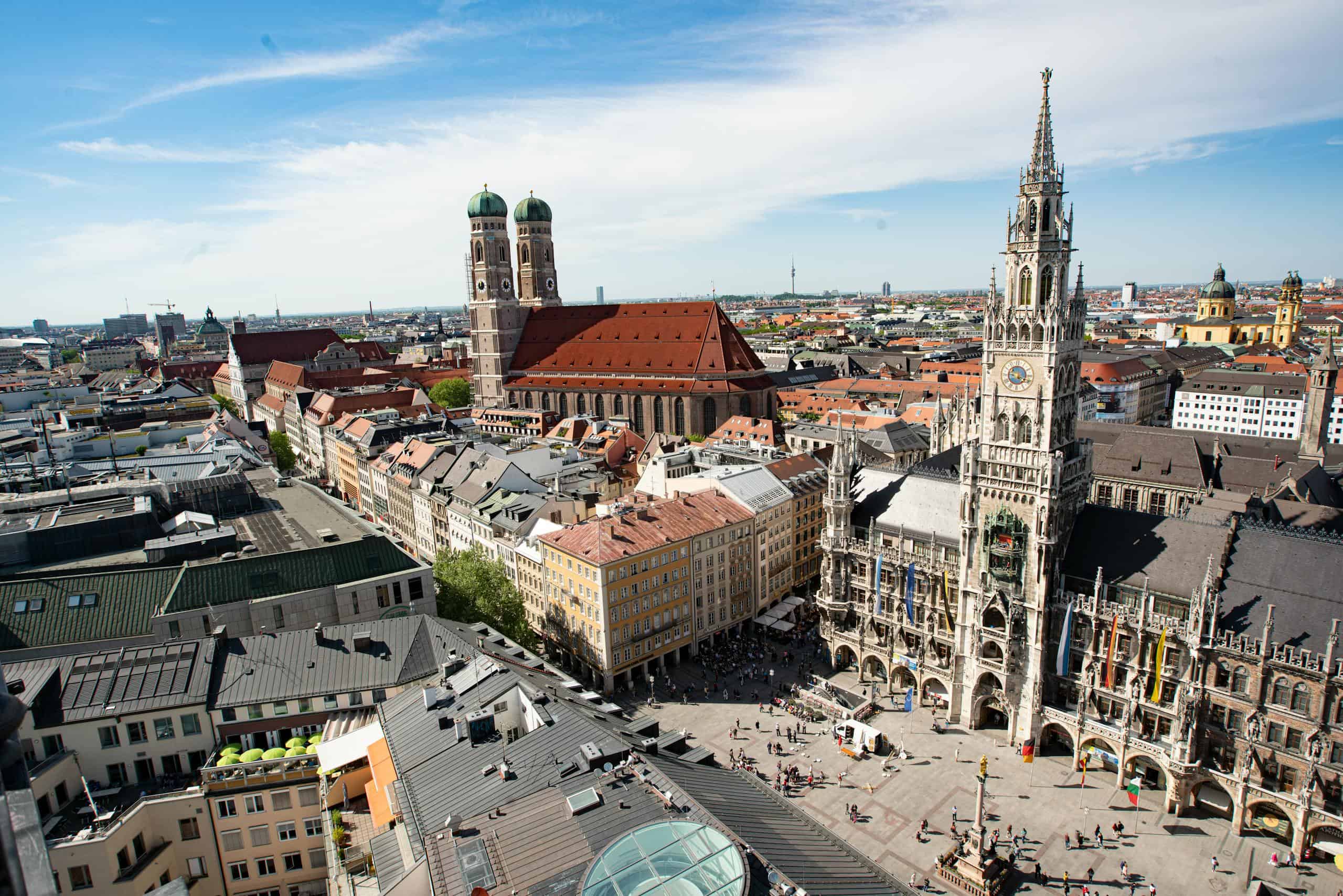 Majestic aerial view of Munich's Marienplatz and Frauenkirche showcasing historic architecture.