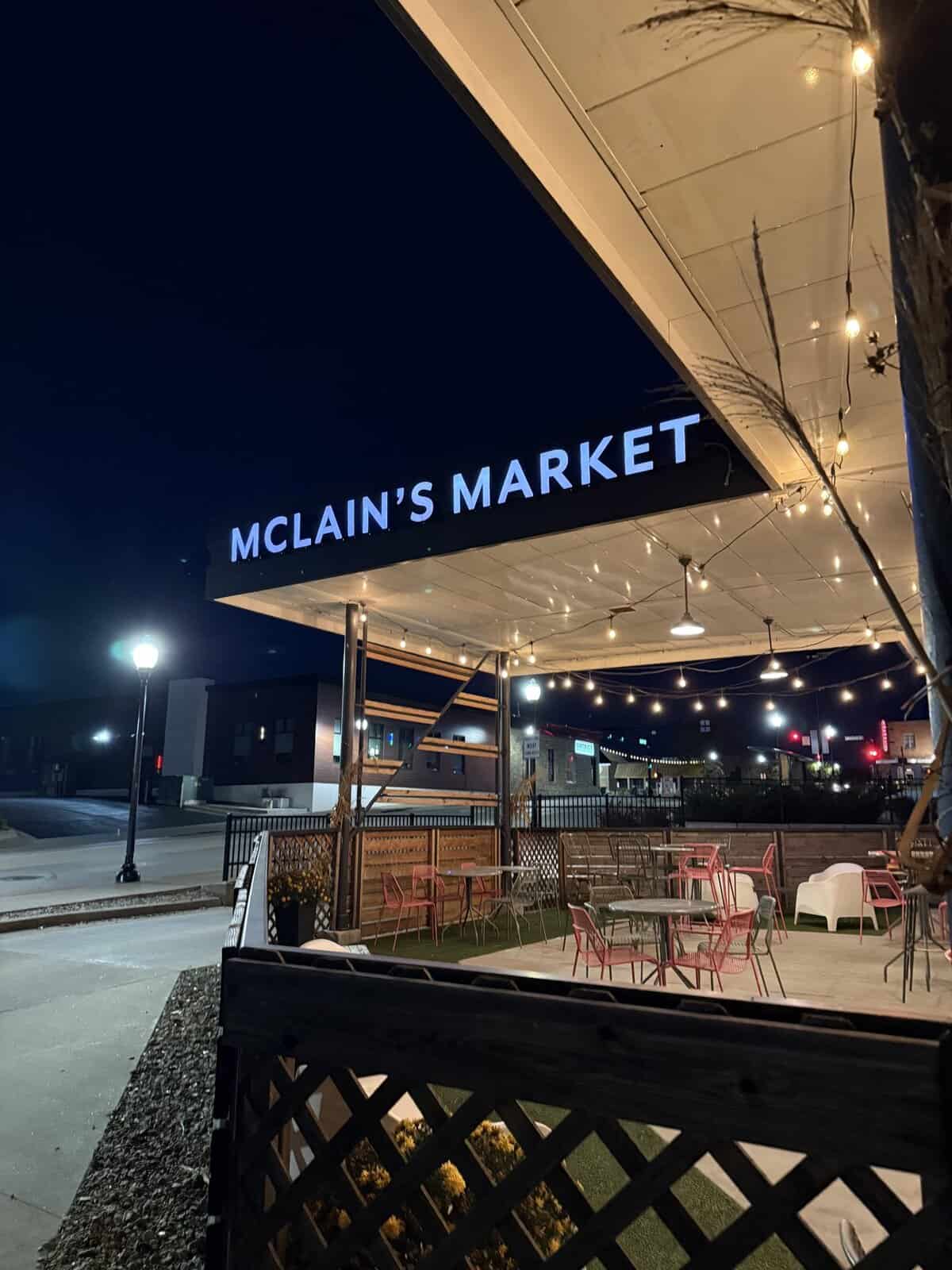 Mclain's Market exterior sign and patio Shawnee location