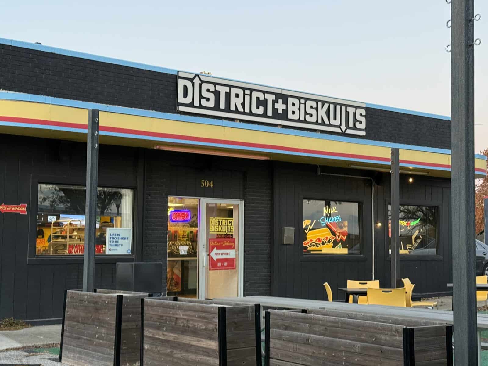 District + Biskuits front of building North Kansas City Mo, colorful stripes on black building
