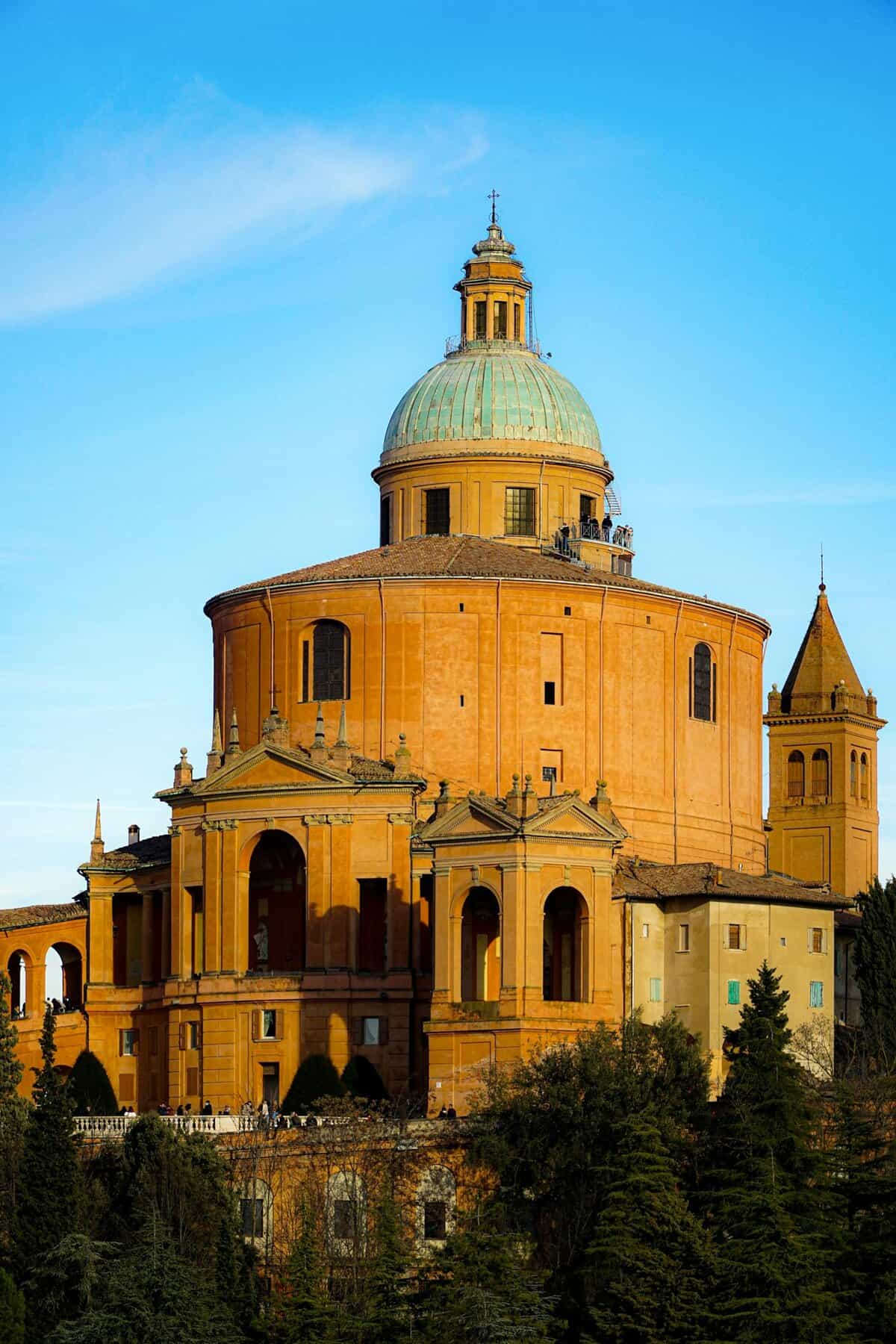 Beautiful view of Madonna di San Luca Sanctuary in Bologna, Italy with clear blue sky.