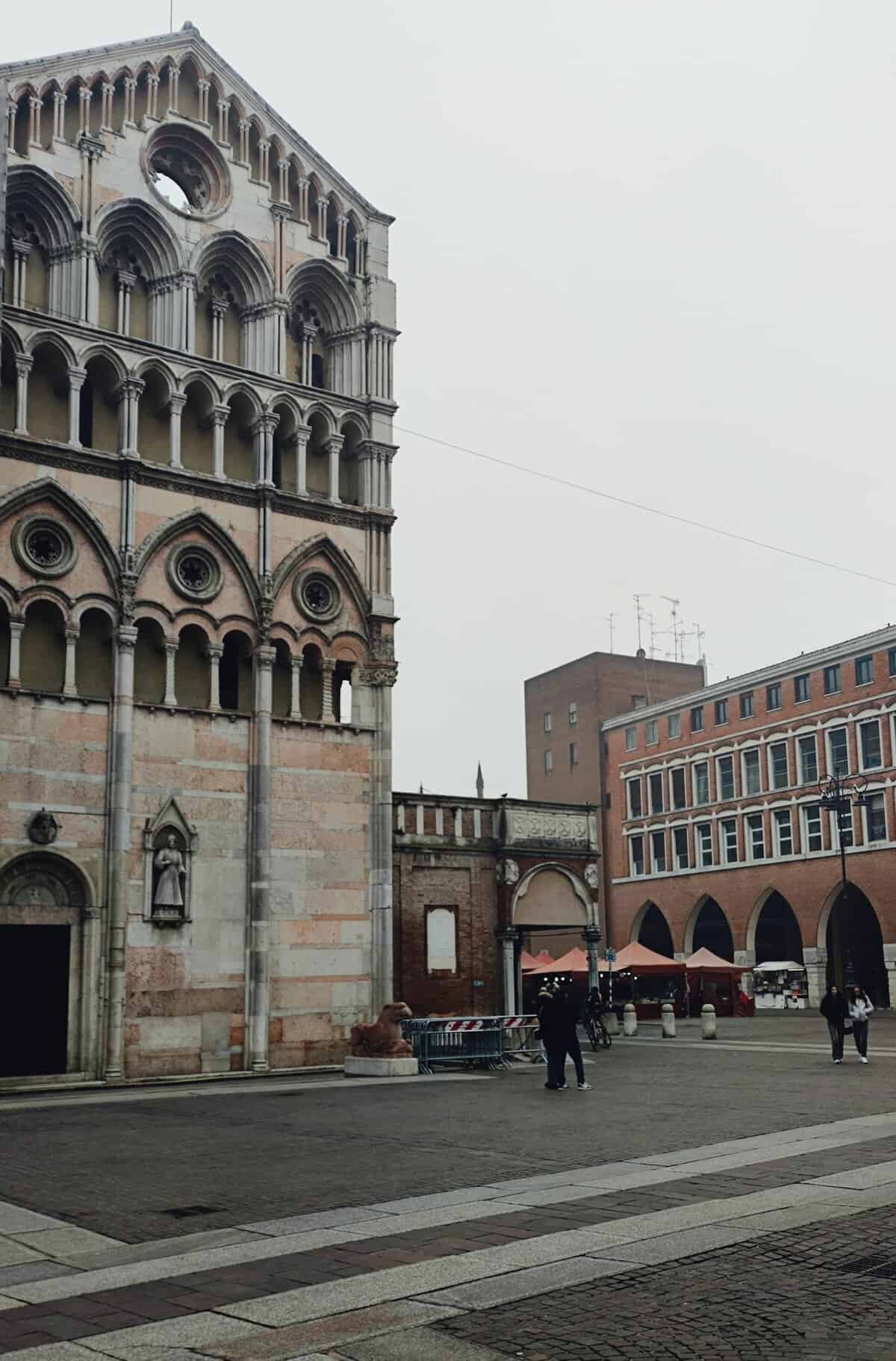 View of Ferrara Cathedral and town square, capturing Italy's architectural charm.
