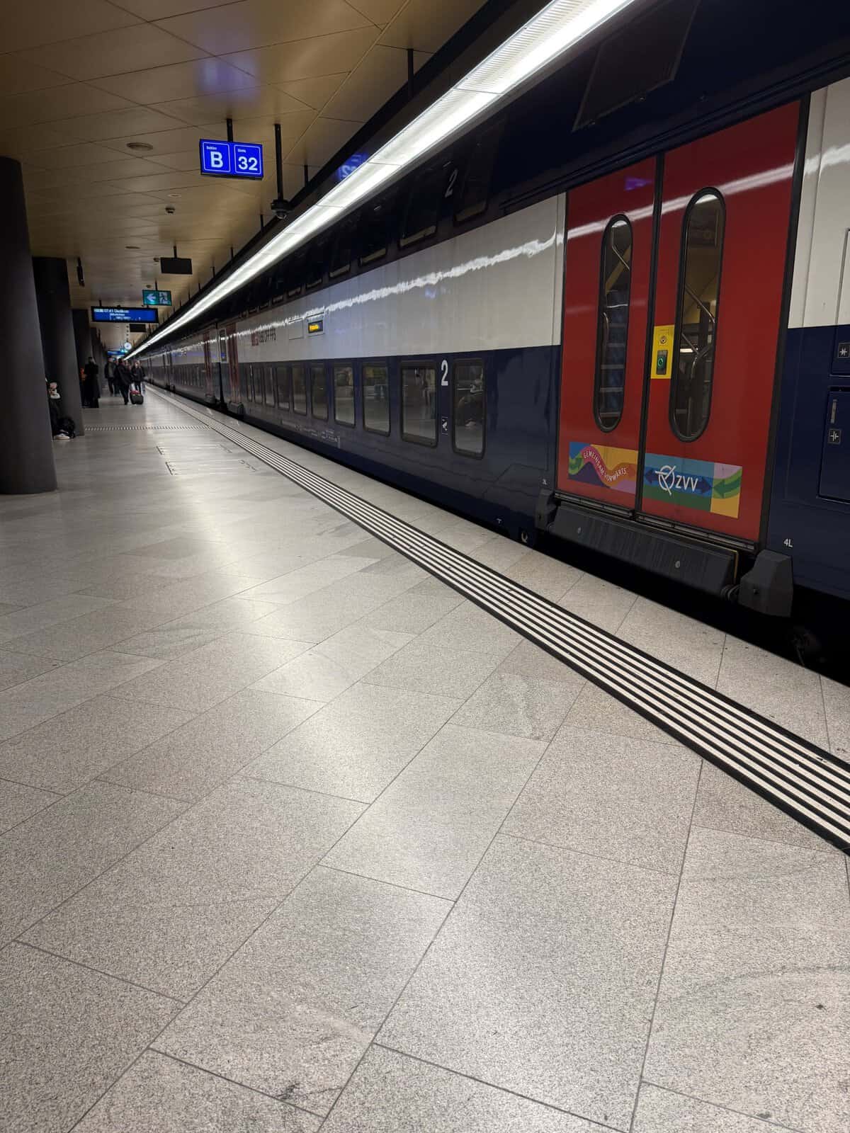 Swiss train waiting at Zurich Hauptbahnhof platform, a starting point for day trips across Switzerland