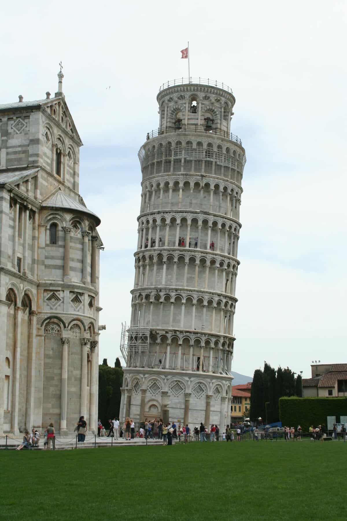 Leaning Tower of Pisa, a famous architectural landmark in Italy, with tourists.