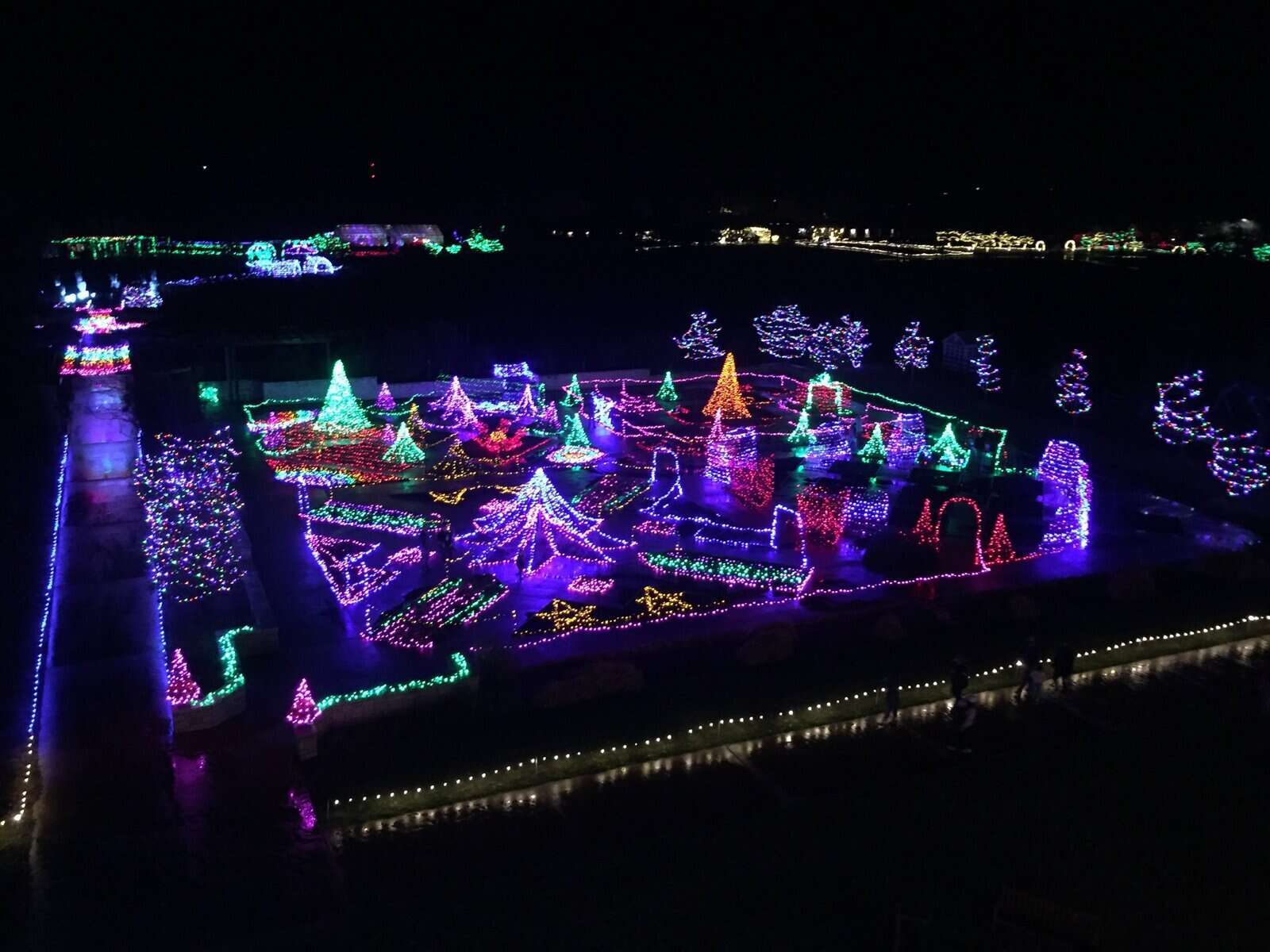 Powell Gardens Festival of Lights near Kansas City with illuminated trees and maze aerial view at night