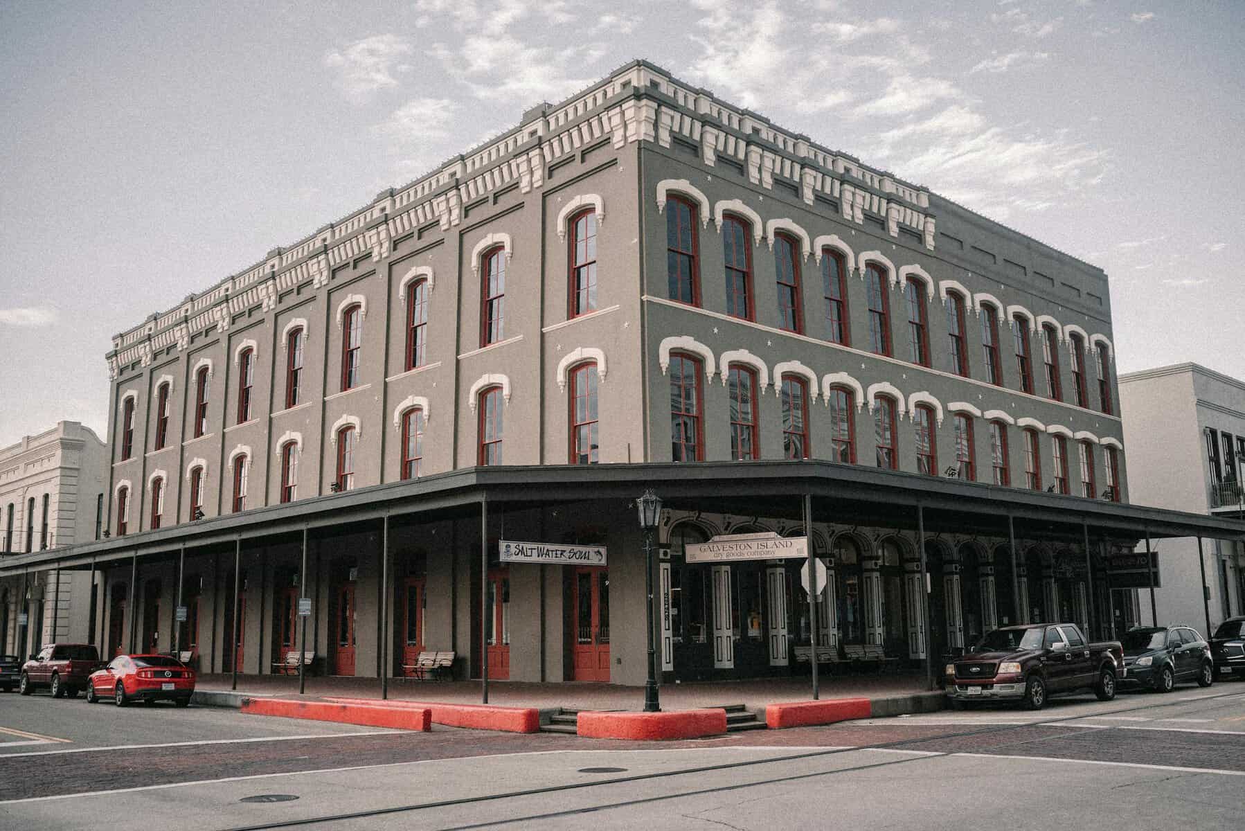 A classic historical building facade in Downtown Galveston, Texas on a cloudy day.