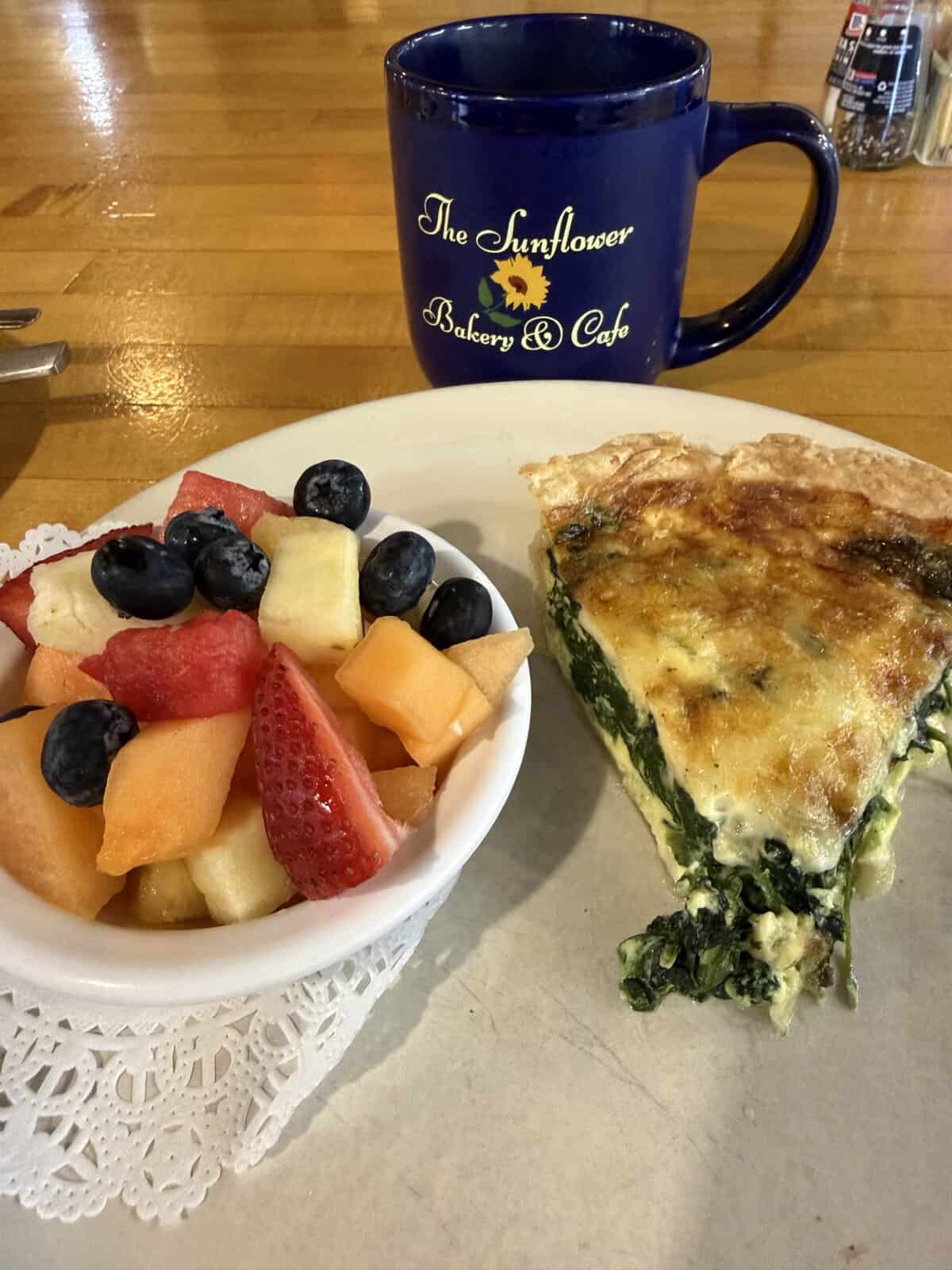 Breakfast at Sunflower Bakery and Cafe in Galveston with quiche and fresh fruit
