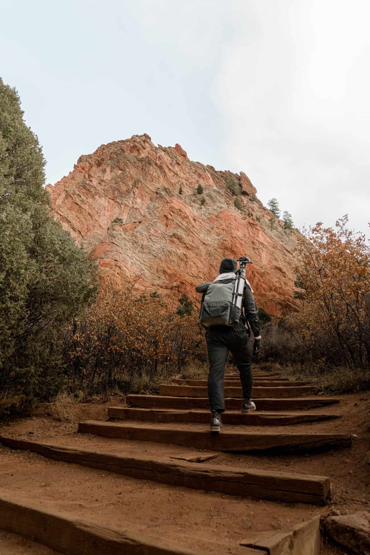 A man hiking up steps, Colorado Springs Best things to do Manitou Incline.