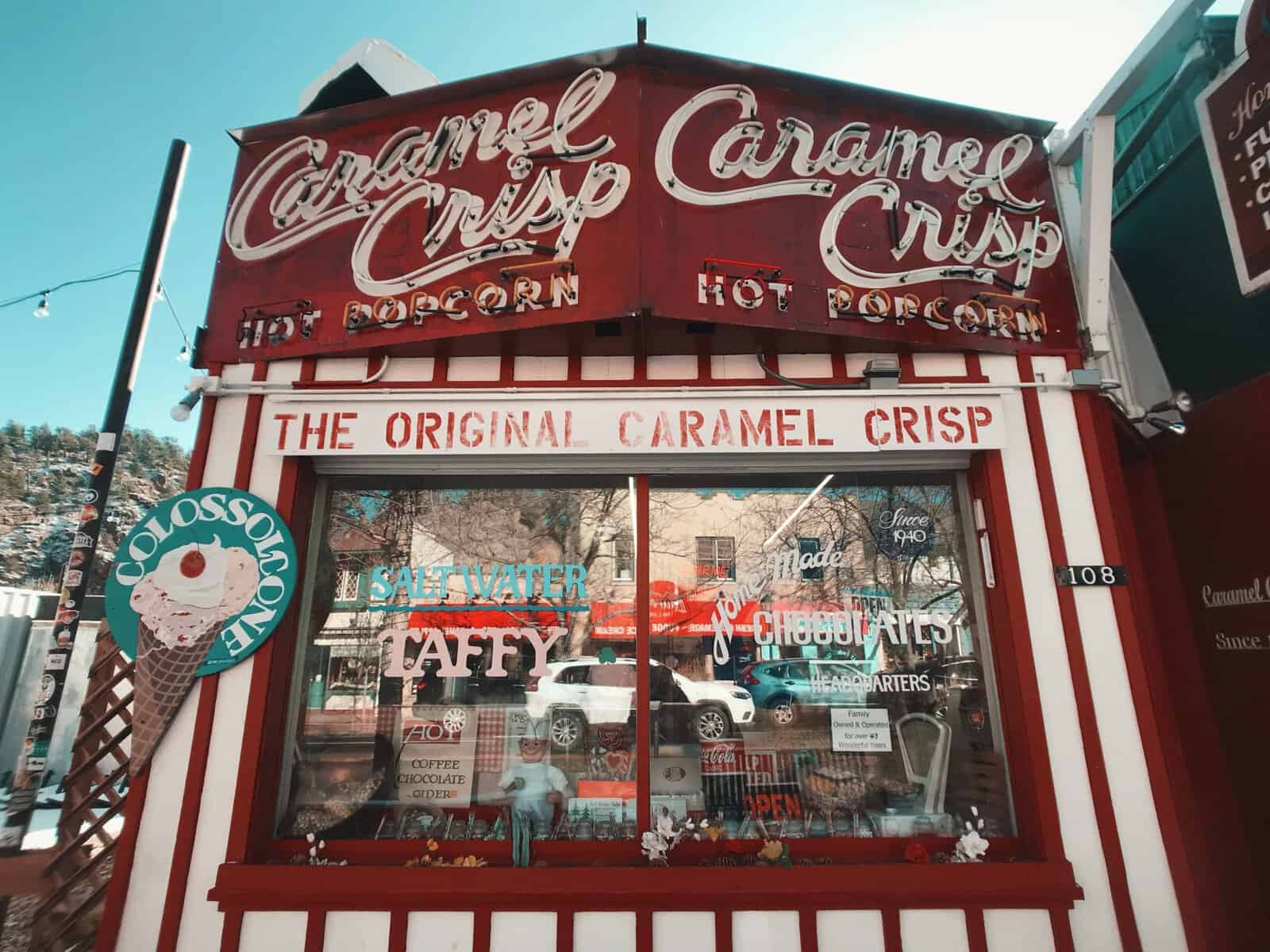 Old-fashioned candy store selling the Original Caramel Crisp, saltwater taffy, chocolates, and popcorn in downtown Estes Park, Colorado.