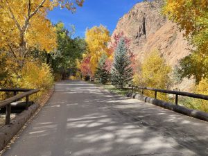 Scenic paved walkway through Seven Falls canyon during fall near Colorado Springs.