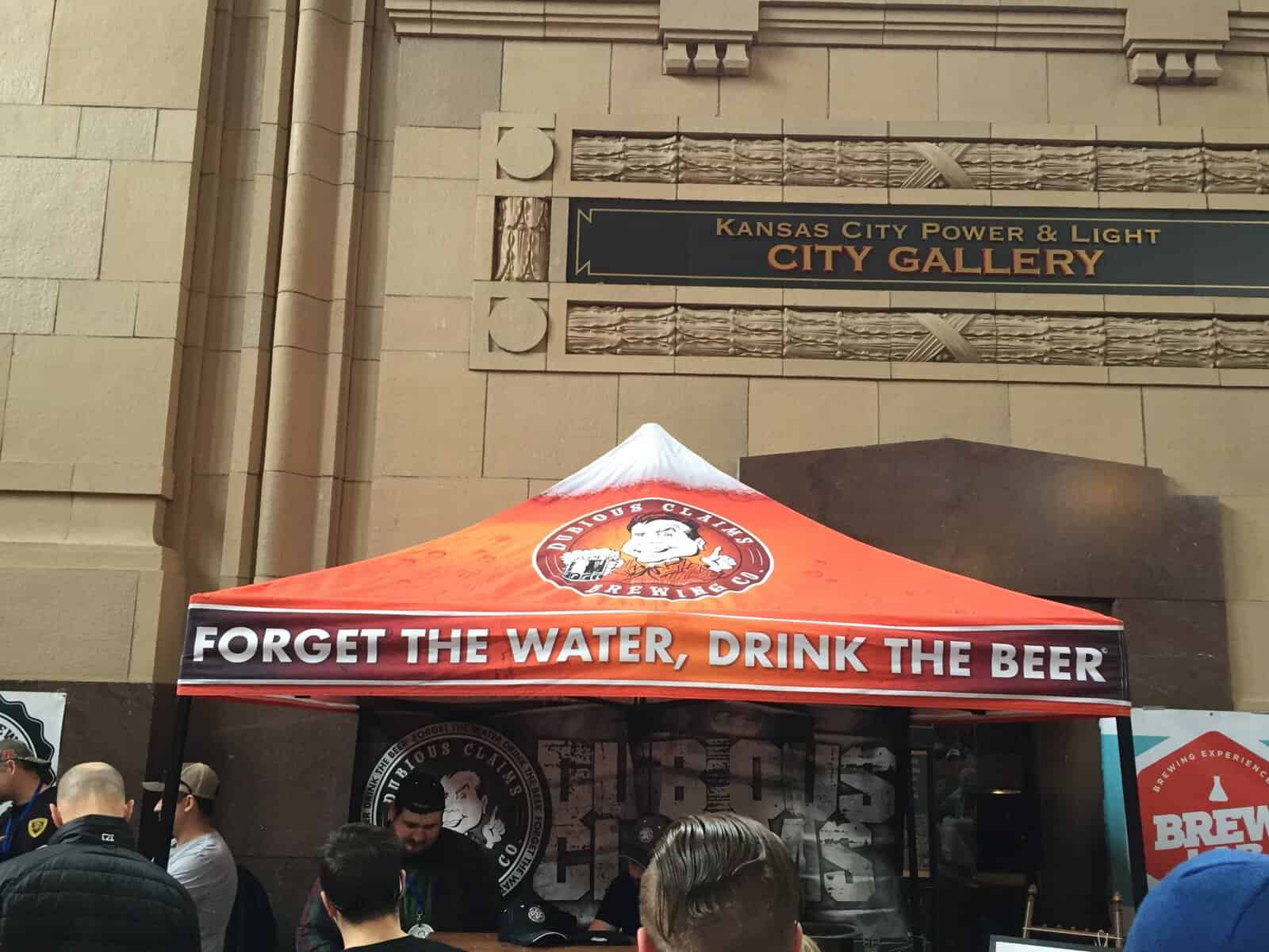 Beer vendor tent at Kansas City Brew Fest inside the Kansas City Power and Light building