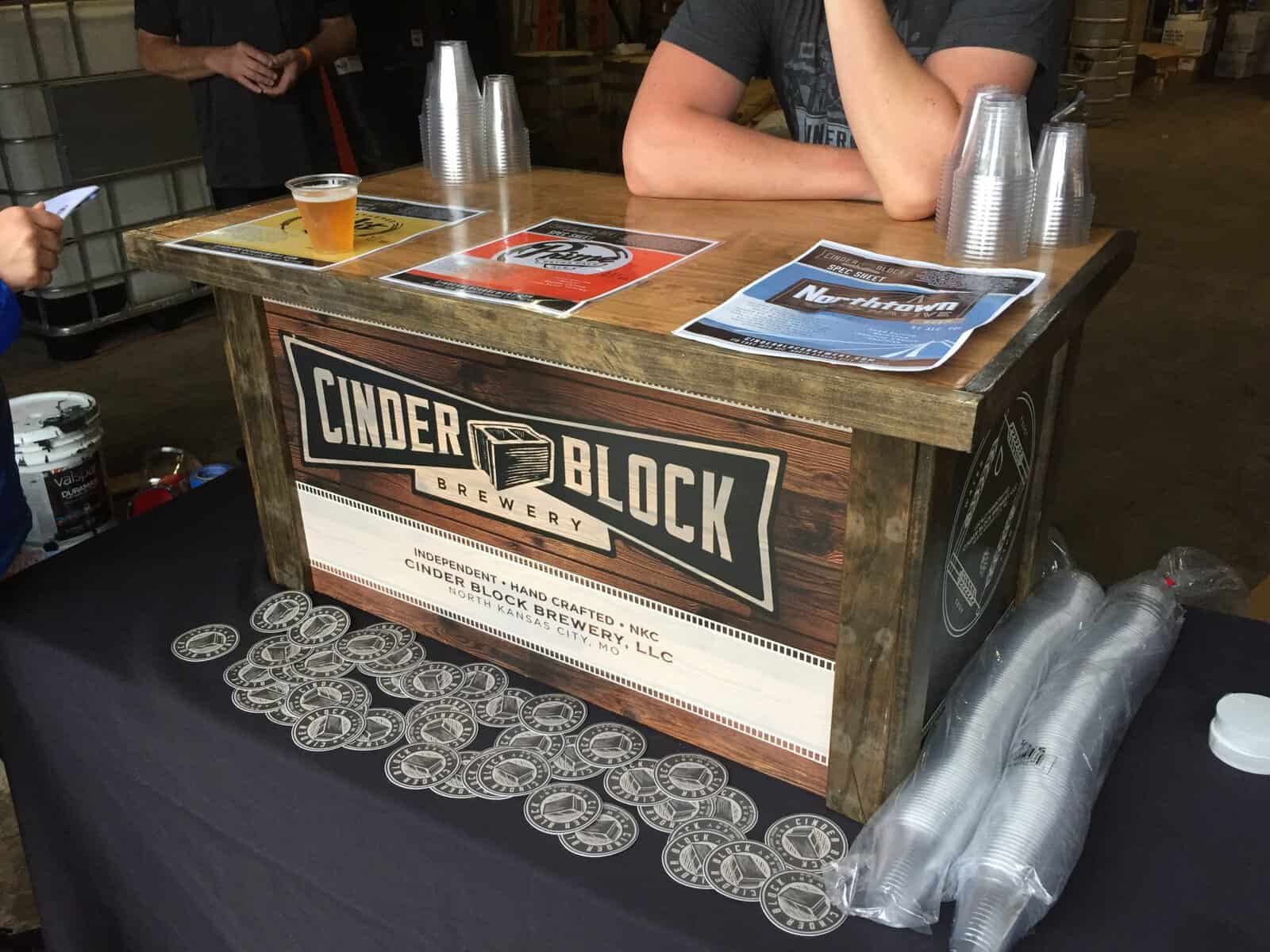 Cinder Block Brewery booth serving beer at a Kansas City beer festival
