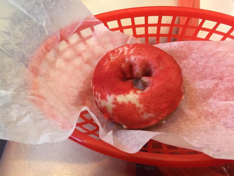 Red and white Cherry Bomb donut from The Donut Whole in Wichita, Kansas
