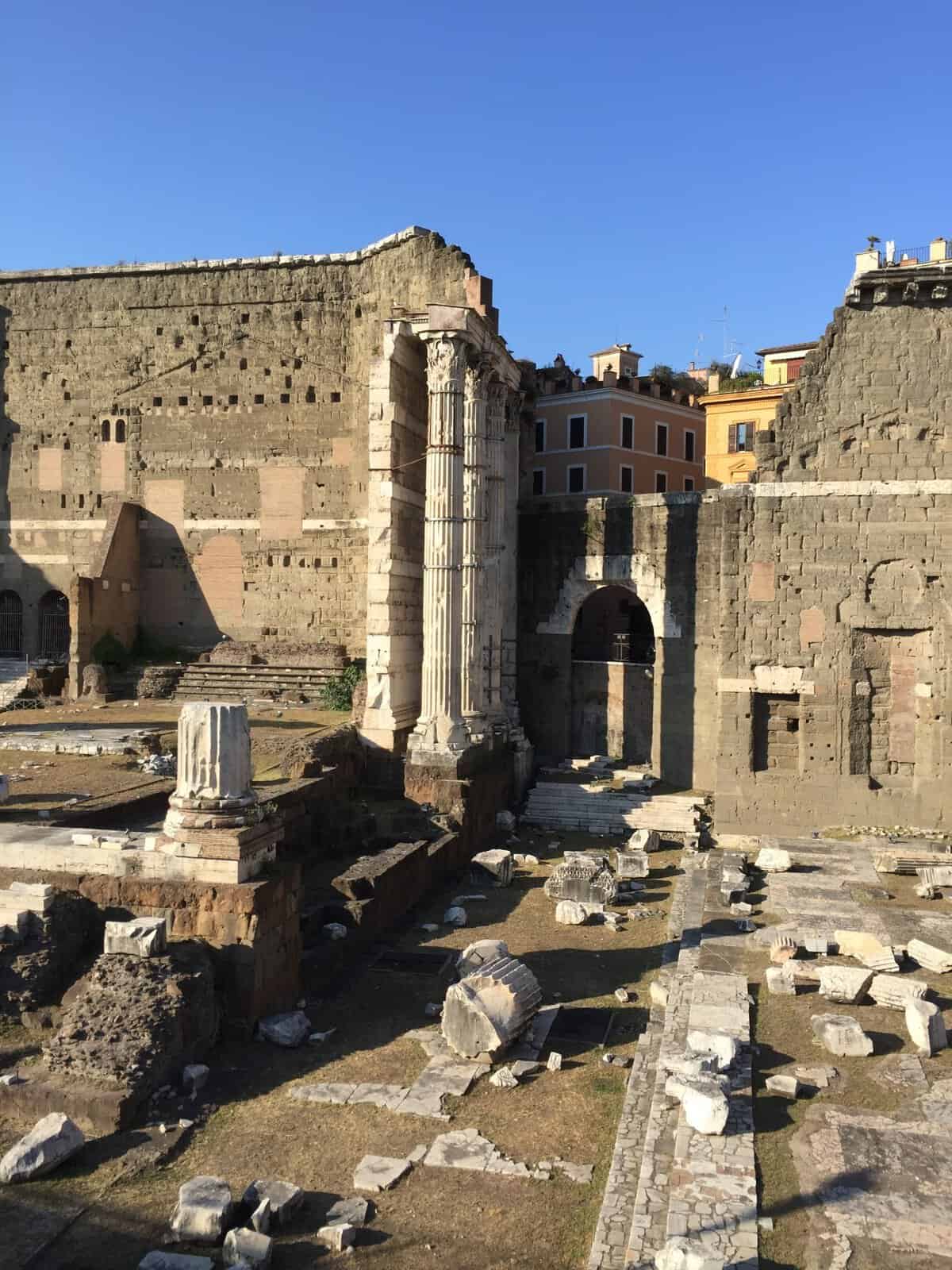 Ancient ruins, columns, and stone walls at the Roman Forum in Rome